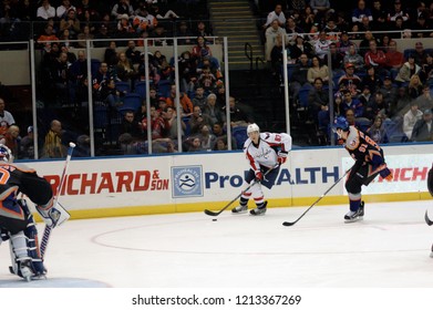UNIONDALE, NEW YORK, UNITED STATES – March 9, 2013: NHL Hockey: Game Action Between The Washington Capitals And New York Islanders At Nassau Coliseum. Jay Beagle #83. John Tavares #91.