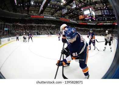 UNIONDALE, NEW YORK, UNITED STATES – Nov. 2, 2013: NHL Hockey: Game Action Between The Boston Bruins And New York Islanders At Nassau Coliseum. John Tavares #91.