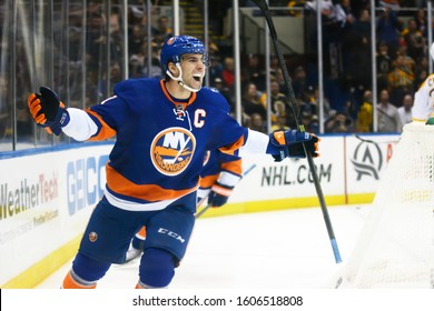UNIONDALE, NEW YORK, UNITED STATES – Nov. 2, 2013: NHL Hockey: New York Islanders forward John Tavares celebrates after scoring a goal against the Boston Bruins at Nassau Veterans Memorial Coliseum.
