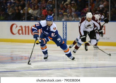 UNIONDALE, NEW YORK, UNITED STATES – FEB 8, 2014: NHL Hockey: John Tavares, Of The New York Islanders During A Game Against The Colorado Avalanche At Nassau Veterans Memorial Coliseum.