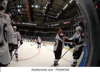 UNIONDALE, NEW YORK, UNITED STATES – FEB 8, 2014: NHL Hockey: Fish-eye View Of Colorado Avalanche During Warm-ups Prior To Game Between Avalanche And New York Islanders. Nathan MacKinnon #29.