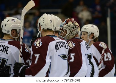 UNIONDALE, NEW YORK, UNITED STATES – FEB 8, 2014: NHL Hockey: Colorado Avalanche Players Celebrate After Defeating The New York Islanders At Nassau Coliseum. Jean-Sebastien Giguere, Nathan MacKinnon.