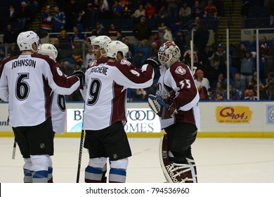 UNIONDALE, NEW YORK, UNITED STATES – FEB 8, 2014: NHL Hockey: Colorado Avalanche Players Celebrate After Defeating The New York Islanders At Nassau Coliseum. Erik Johnson, Matt Duchene.