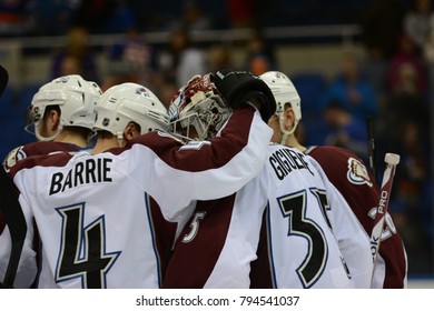 UNIONDALE, NEW YORK, UNITED STATES – FEB 8, 2014: NHL Hockey: Colorado Avalanche Players Celebrate After Defeating The New York Islanders At Nassau Coliseum. Jean-Sebastien Giguere, Tyson Barrie.