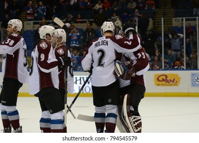 UNIONDALE, NEW YORK, UNITED STATES – FEB 8, 2014: NHL Hockey: Colorado Avalanche Players Celebrate After Defeating The New York Islanders At Nassau Coliseum. Matt Duchene, Nick Holden.