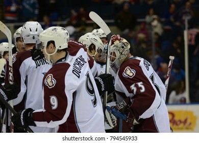 UNIONDALE, NEW YORK, UNITED STATES – FEB 8, 2014: NHL Hockey: Colorado Avalanche Players Celebrate After Defeating The New York Islanders At Nassau Coliseum. Matt Duchene, Jean-Sebastien Giguere.