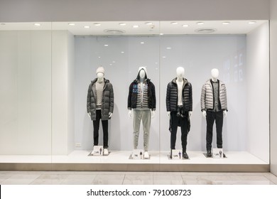 Uniqlo at Emquatier, Bangkok, Thailand, Oct 27, 2017 : Luxury and fashionable brand window display. Winter collection of casual wear display at flagship store.  Wide screen capture.