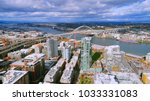 Unique aerial perspective of Fremont Bridge over the willamette river in the pearl district of downtown Portland Oregon on a perfect day.