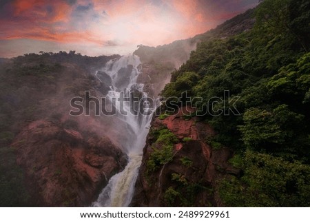 Unique and amazed nature scenic landscape of  Dudhsagar Falls in rain forest. Sonaulim, Goa, India. Tourism beautiful destination place.  Discover the beauty of earth. Open world after covid-19