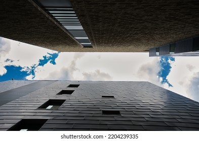 Unique Angle Of Architectural Buildings, Looking Up At The Sky Between Buildings