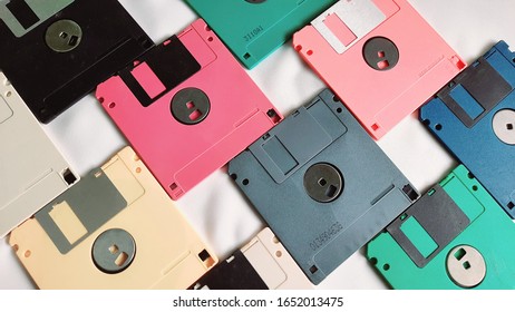 Unique arrangement of colorful floppy disks/diskette as a background or table or wall decoration