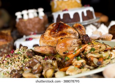 Unique Beautiful Christmas Meal Platter, With Roast Chicken And Vegetables, Surrounded By Cakes, Mince Pies, Fruit, Bread And Jam.