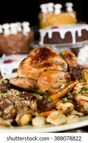 Unique Beautiful Christmas Meal Platter, With Roast Chicken And Vegetables, Surrounded By Cakes, Mince Pies, Fruit, Bread And Jam.