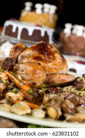 Unique Beautiful Christmas Meal Platter, With Roast Chicken And Vegetables, Surrounded By Cakes, Mince Pies, Fruit, Bread And Jam.