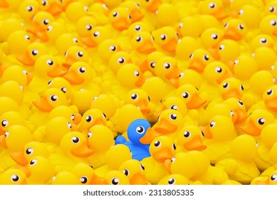 Unique blue toy duck among many yellow ones. Standing out from crowd, individuality and difference concept - Shutterstock ID 2313805335