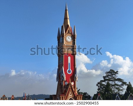 A unique building with a background of blue sky and clouds in the New Celosia flower garden, Semarang, Central Java.