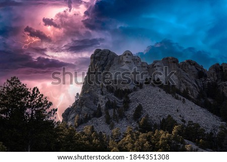Similar – Image, Stock Photo Dramatic storm over Monument Valley road