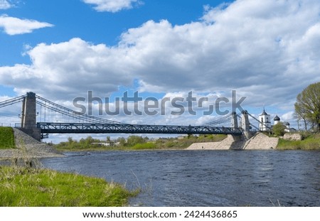 Unique Chain Bridges over the Velikaya River. Suspension bridge over the Velikaya River in the city of Ostrov. Pskov region. Russia