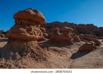 An unique eroded rock formations create majestic desert landscape under clear sky in utah usa evoking feeling of wonder and awe. geological marvels stand tall