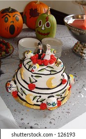 Unique Halloween Wedding Cake With Fondant Characters.