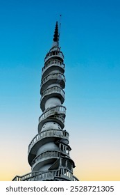  a unique and iconic structure located in Sri Lanka. It is a tall, spiraling white tower that is part of the Ambuluwawa Biodiversity Complex. The tower stands out for its striking design.