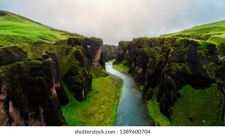 Unique landscape of Fjadrargljufur in Iceland. Top tourism destination. Fjadrargljufur Canyon is a massive canyon about 100 meters deep and about 2 kilometers long, located in South East of Iceland. - Powered by Shutterstock