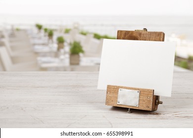 Unique Mockup Menu Frame On Table Over Blurred Restaurant Interior