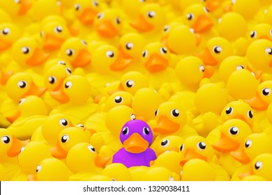 Unique purple toy duck among many yellow ones. Standing out from crowd, individuality and difference concept - Shutterstock ID 1329038411