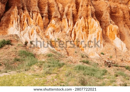 Unique sandstone cliffs and eroded landforms near Loule Portugal in natural daylight. Hidden destination inspires exploration, sustainable tourism and discovery beyond popular landmarks 