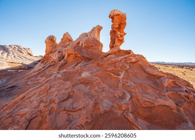 Unique sandstone structures rise from the desert floor at White Pocket in the Vermilion Cliffs National Monument, Arizona USA.