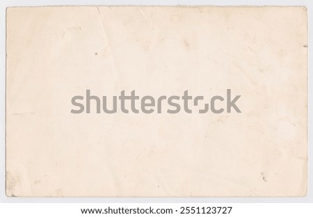 Unique texture of old paper on a white background. Interesting texture of old paper, soiled and darkened by time. The noble beauty of natural antique paper, which is about 60-70 years old.