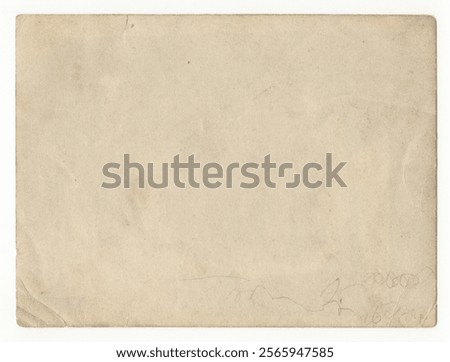 Unique texture of old paper on white background. Interesting old paper has traces of time. The noble beauty of natural old darkened and yellowed paper from the 1940s-1950s.