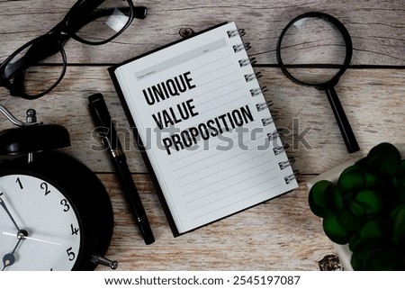 Unique Value Proposition (UVP) text on notepad, Business and Financial concept background
