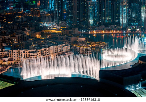 Unique view of Dubai Dancing
Fountain show at night. Tourist attraction. Luxury travel
destination. 