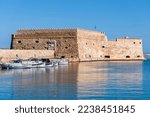 Unique view of Venetian fortress Rocca A Mare massive fortification walls. Heraklion, Crete, Greece