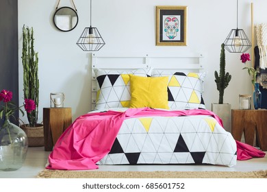 Unique White Bedroom With Colorful Pillows, Geometric Bedclothes And Cactus