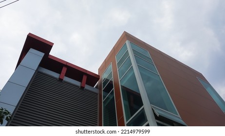 Unique Worker Dormitory Building With Cloudy Sky Background