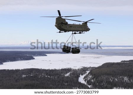  Unit Support Vehicle during sling-load training over Joint Base Elmendorf-Richardson, Alaska, Feb. 28, 2024. U.S. Army Soldiers from the Alaska Army National Guard Aviation Battalion 