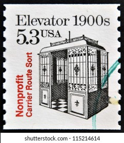 UNITE STATES OF AMERICA - CIRCA 1988: A stamp printed in USA shows Elevator 1900s, nonprofit carrier route sort, circa 1988