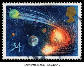 UNITED KINGDOM - CIRCA 1986: A Used Postage Stamp Printed In Britain Celebrating The Appearance Of Halleys Comet Showing Comet Orbiting The Sun And Planets, Circa 1986