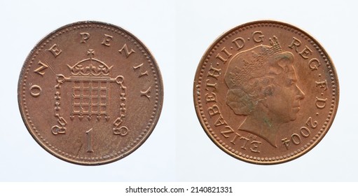 UNITED KINGDOM - CIRCA 2004: One penny coin from United Kingdom showing a portrait of Queen Elizabeth II with crown and a crowned portcullis with chains above the denomination "1" 