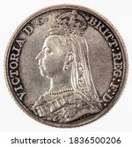 United Kingdom A coin commemorating featuring a portrait of Queen Victoria British Silver "Jubilee Head". Crown Coin. Crowned Victoria left Legend: VICTORIA D:G: BRITT:REG:F:D:Years: 1890 Coins.