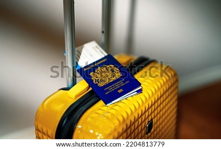 United Kingdom of Great Britain passport on travel suitcase.