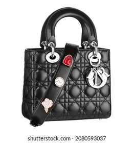 United Kingdom, London - November 25, 2021: Black Luxury Lady Dior Bag Isolated On White. Lambskin Leather Women Shopping Bag. Women's Top Handle Shopper Tote Bag Padlock. Handbags