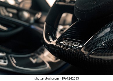 United Kingdom, Manchester April 2021. A 2017 Mercedes Benz E63s AMG W213 With Aftermarket Carbon Fibre Steering Wheel With AMG In Carbon Logo