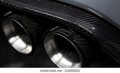 United Kingdom, Manchester June 2022. The Optional BMW M Performance Carbon Fibre Rear Diffuser And M Performance Metal Exhaust Tips On A 2015 BMW M4 F83 Cabriolet 