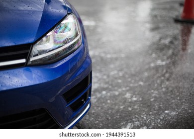 United Kingdom, Manchester March 2021.The Front Headlight Of A 2016 Volkswagen Golf R In Blue