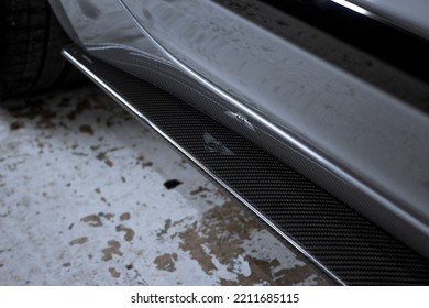 United Kingdom, Manchester October 2022.The Bentley Wings Badge Logo On The Optional Carbon Fibre Side Skirts Of A 2022 Bentley Flying Spur