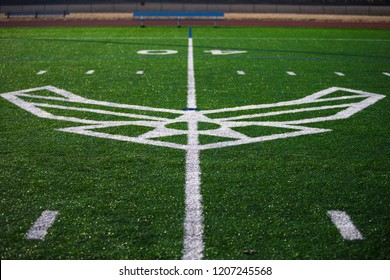 United States Air Force, USAF, Emblem Logo Painted White On A Green Astroturf Football Soccer Field.