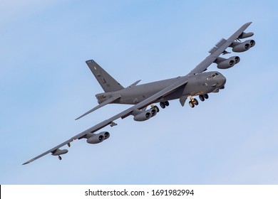 United States Air Force (USAF) Boeing B52 Nuclear Bomber turning towards the camera against a blue sky